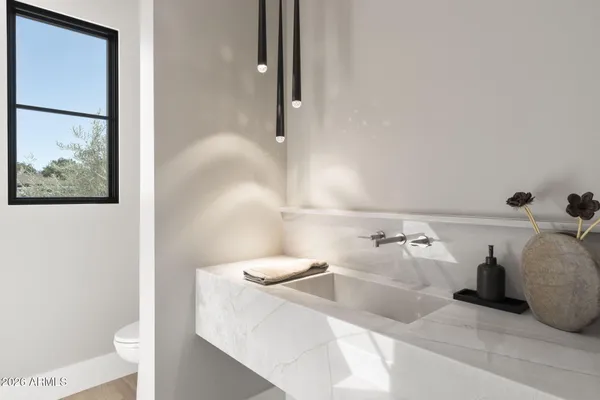 a bathroom with a tub and shower