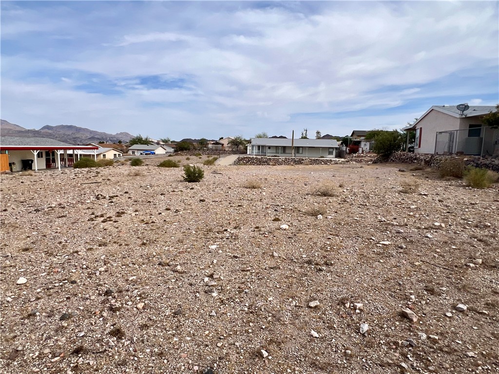 3370 Ridge View Avenue Bullhead City, AZ 86429 - Photo 8 of 10 a view of a lake with houses