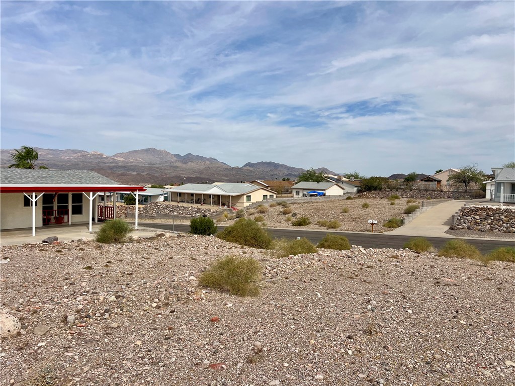 3370 Ridge View Avenue Bullhead City, AZ 86429 - Photo 9 of 10 a view of a house with a ocean view