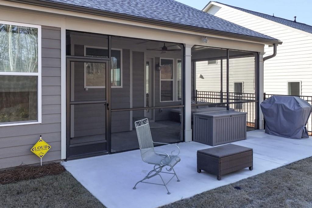 226 Geneva Way Hoschton, GA 30548 - Photo 35 of 84 a living room with furniture