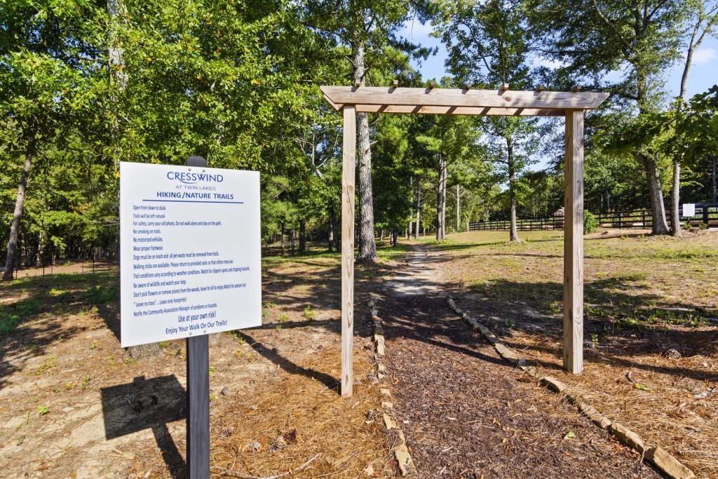 226 Geneva Way Hoschton, GA 30548 - Photo 84 of 84 a view of a back yard with a wooden fence