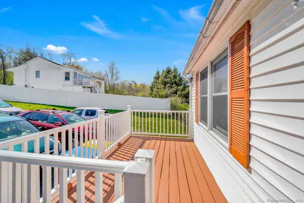 a view of balcony with small garden