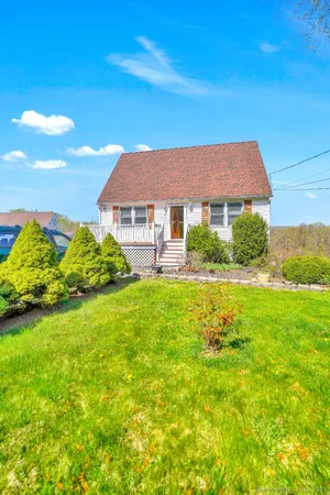 a house view with a garden space