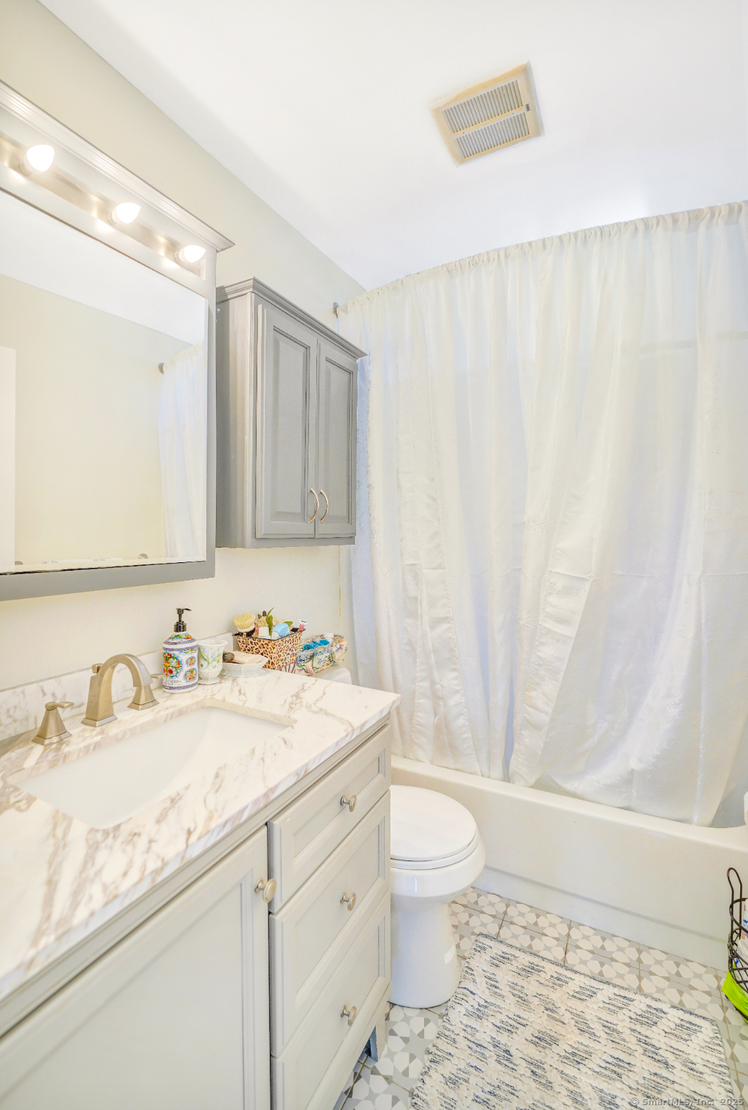 701 Bucks Hill Road Waterbury, CT 06704 - Photo 7 of 20 a bathroom with a sink a toilet and a shower