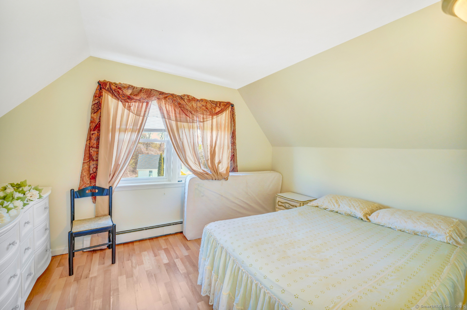 701 Bucks Hill Road Waterbury, CT 06704 - Photo 9 of 20 a bedroom with a bed and a window