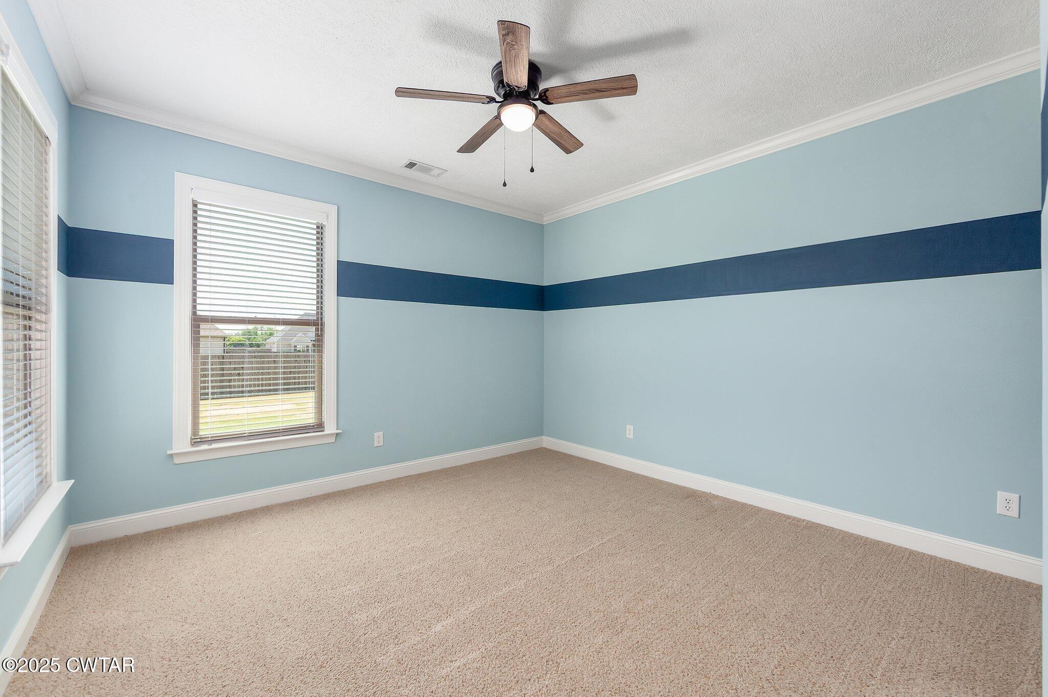 42 Cheddleton Cove Jackson, TN 38305 - Photo 19 of 37 a view of an empty room with a window