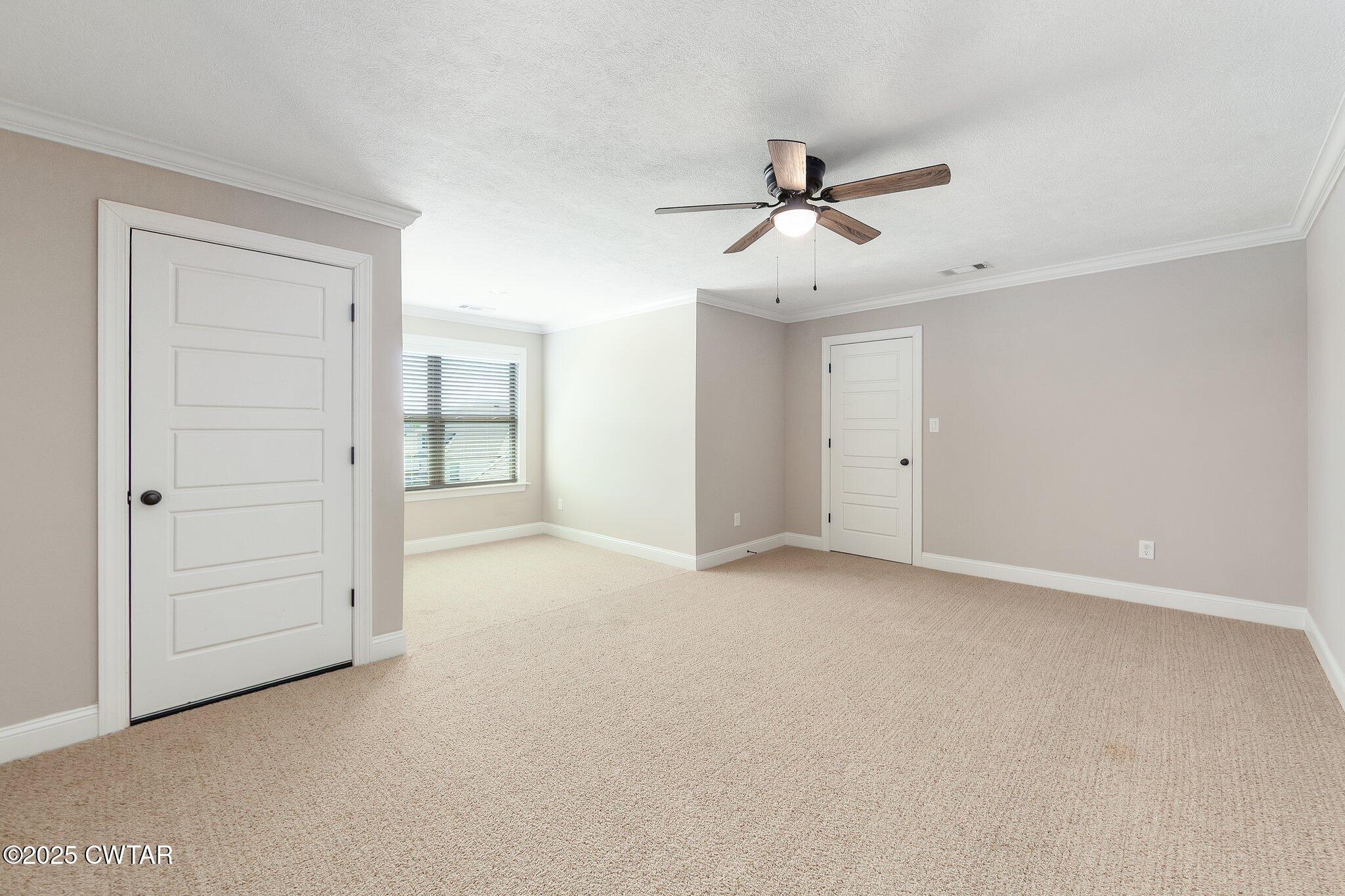 42 Cheddleton Cove Jackson, TN 38305 - Photo 28 of 37 a view of an empty room and closet area