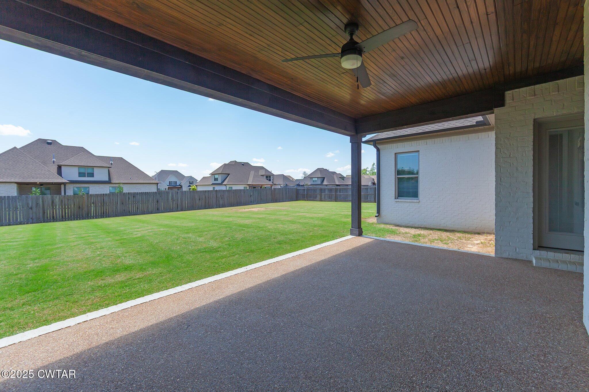 42 Cheddleton Cove Jackson, TN 38305 - Photo 31 of 37 a view of a house with a backyard