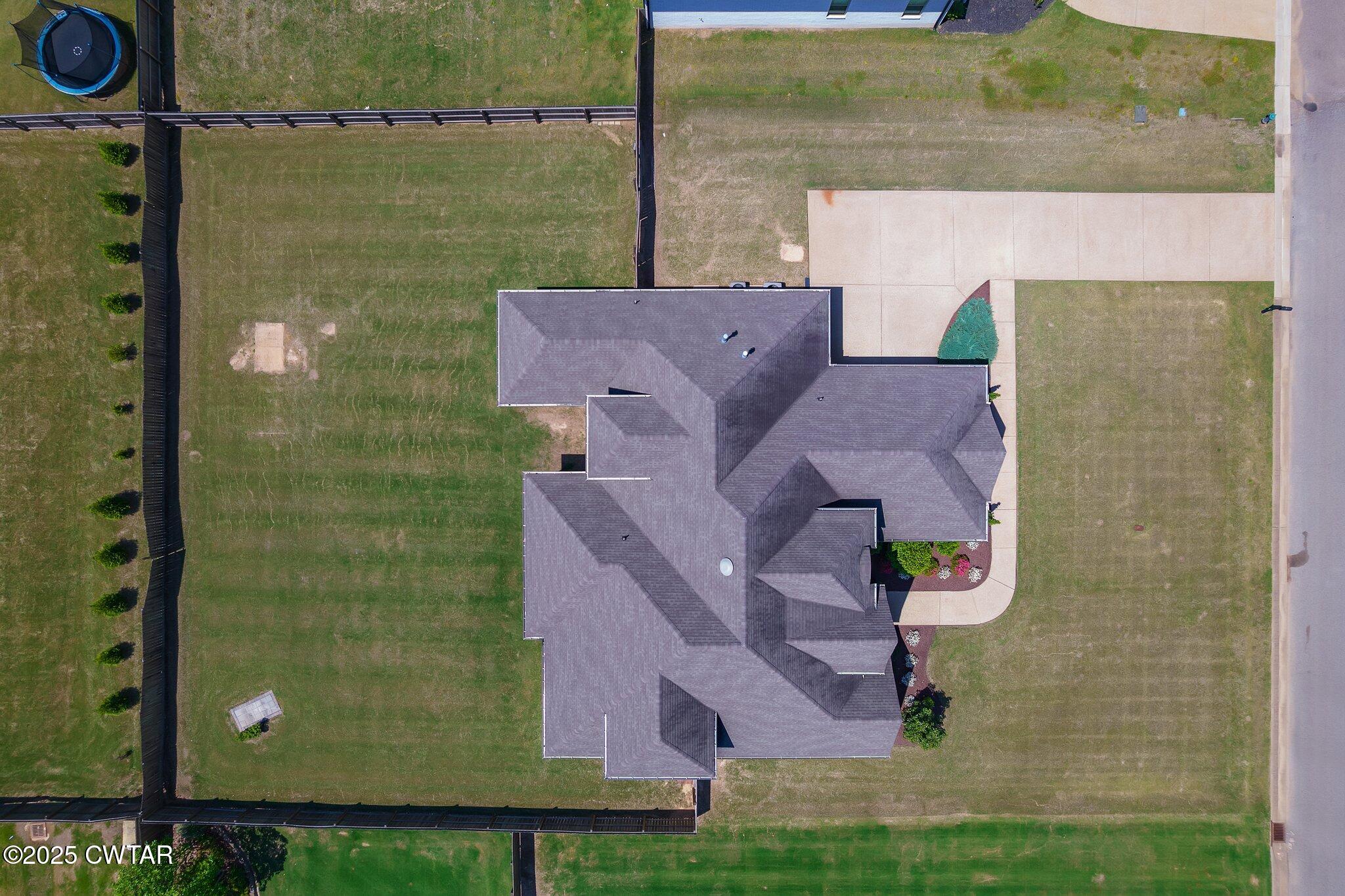 42 Cheddleton Cove Jackson, TN 38305 - Photo 35 of 37 an aerial view of a house with a garden