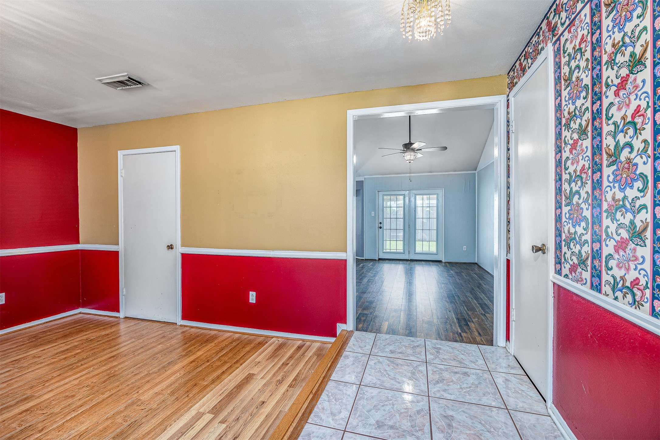 206 Kelly Lane Baytown, TX 77521 - Photo 27 of 38 As you walk thru the front door, you are welcomed with a tile entrance and formal dining area.