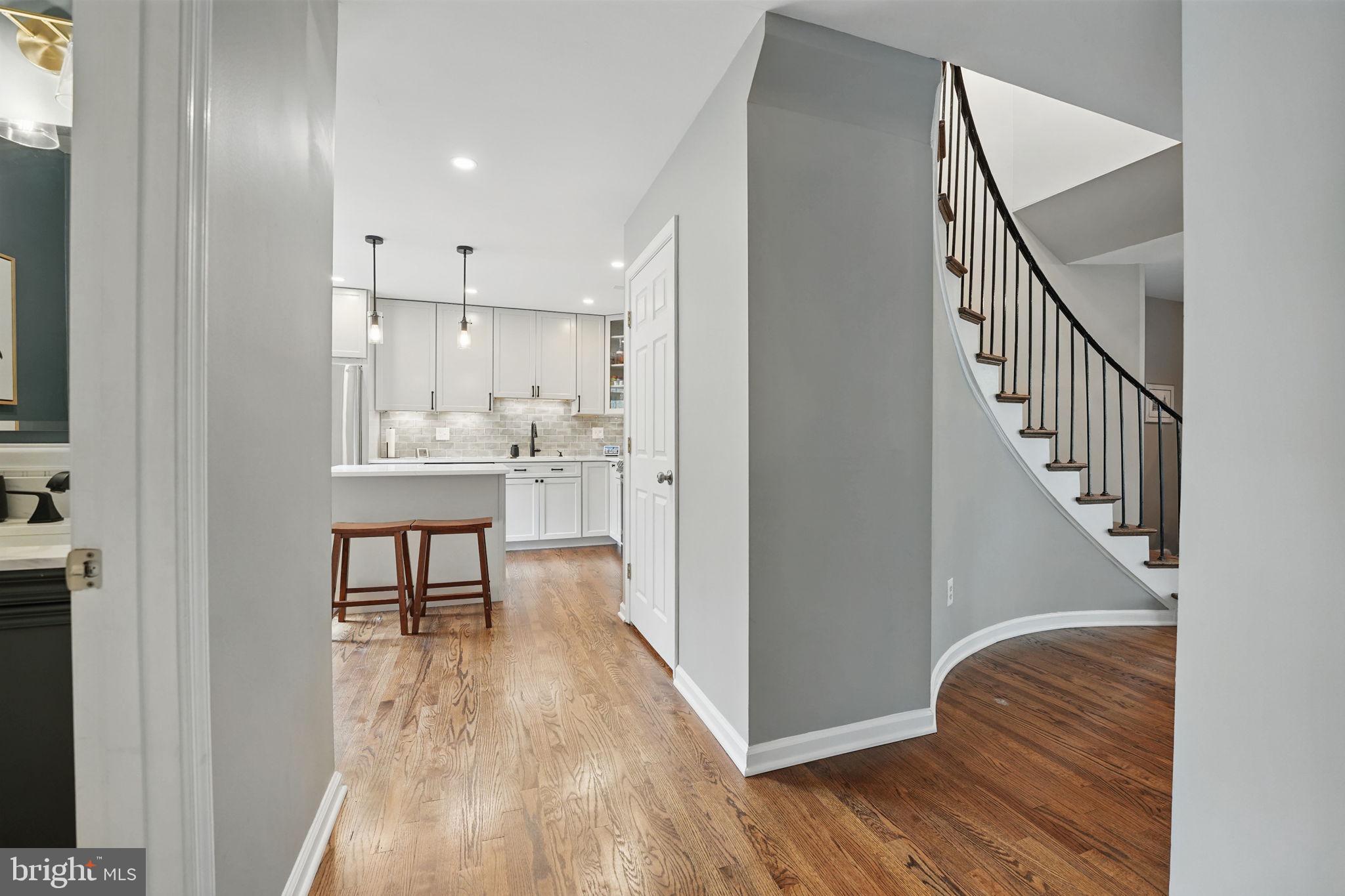 8333 Wickham Road Springfield, VA 22152 - Photo 14 of 54 a view of kitchen and dining room with wooden floor