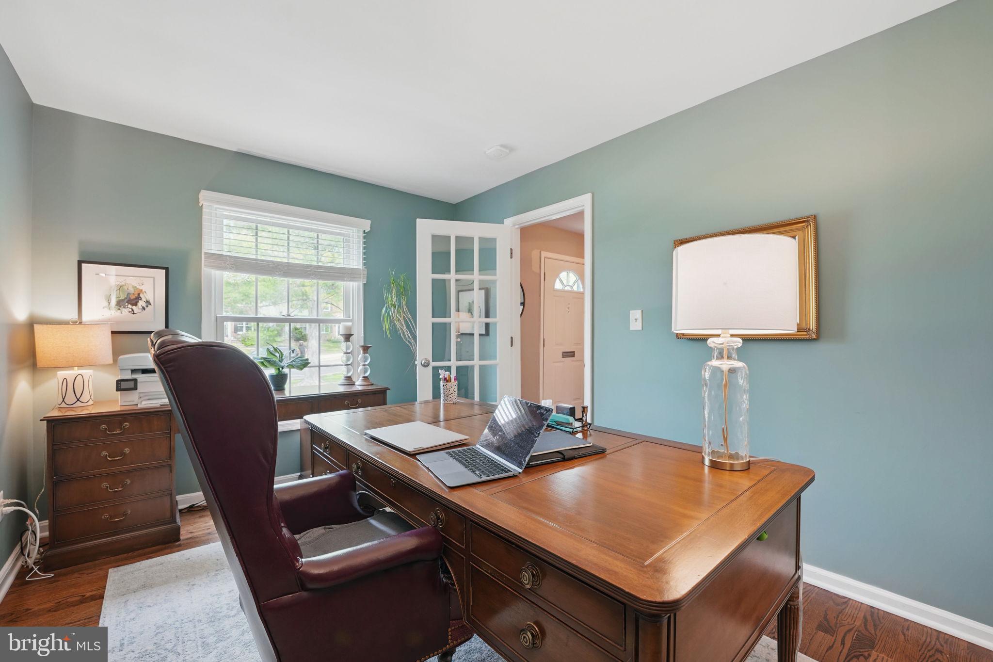 8333 Wickham Road Springfield, VA 22152 - Photo 22 of 54 a view of a workspace with furniture and a window