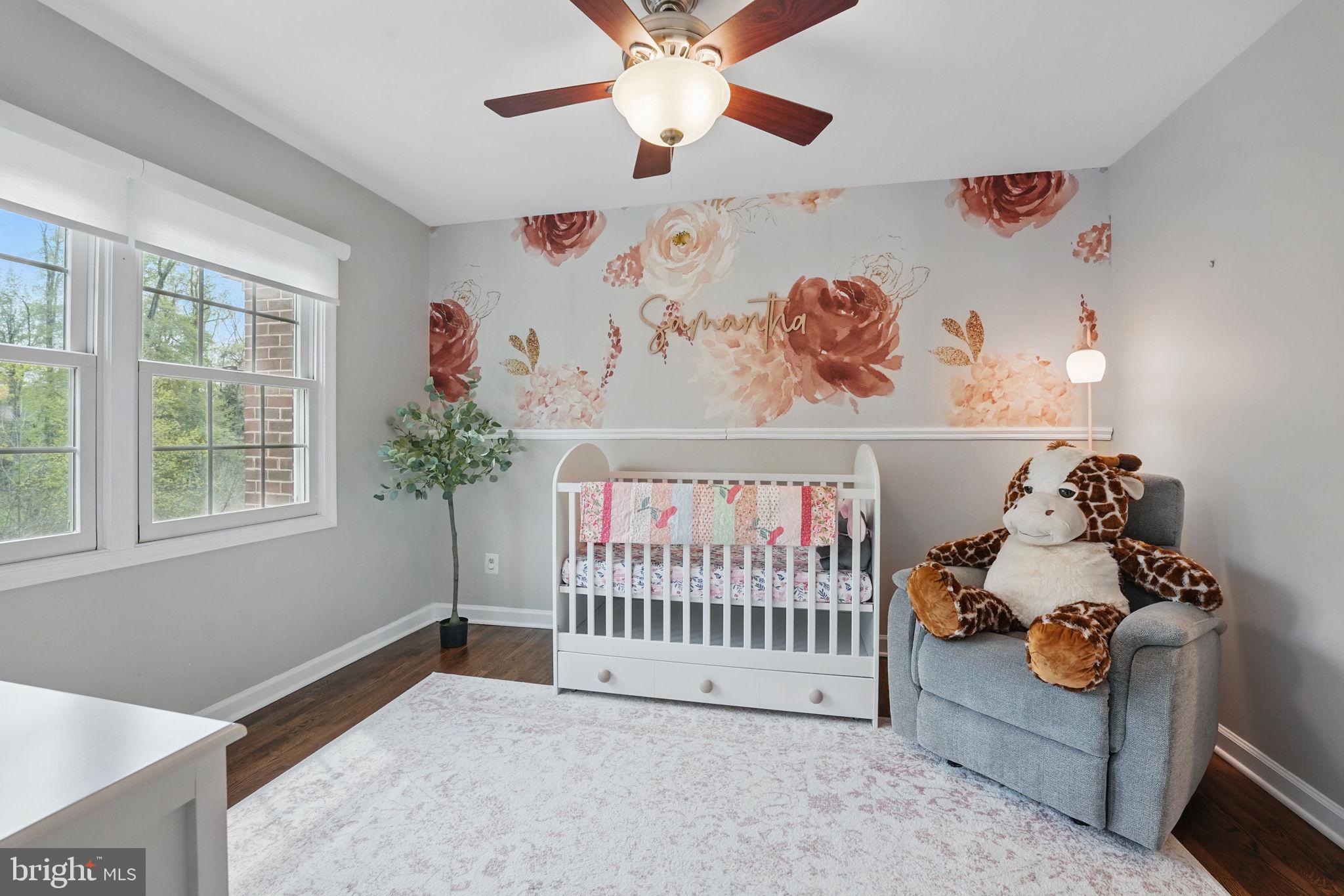8333 Wickham Road Springfield, VA 22152 - Photo 34 of 54 a bedroom with furniture and a window