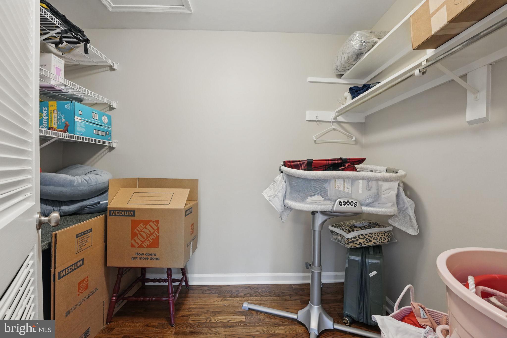 8333 Wickham Road Springfield, VA 22152 - Photo 35 of 54 a view of storage and utility room with racks on the wall