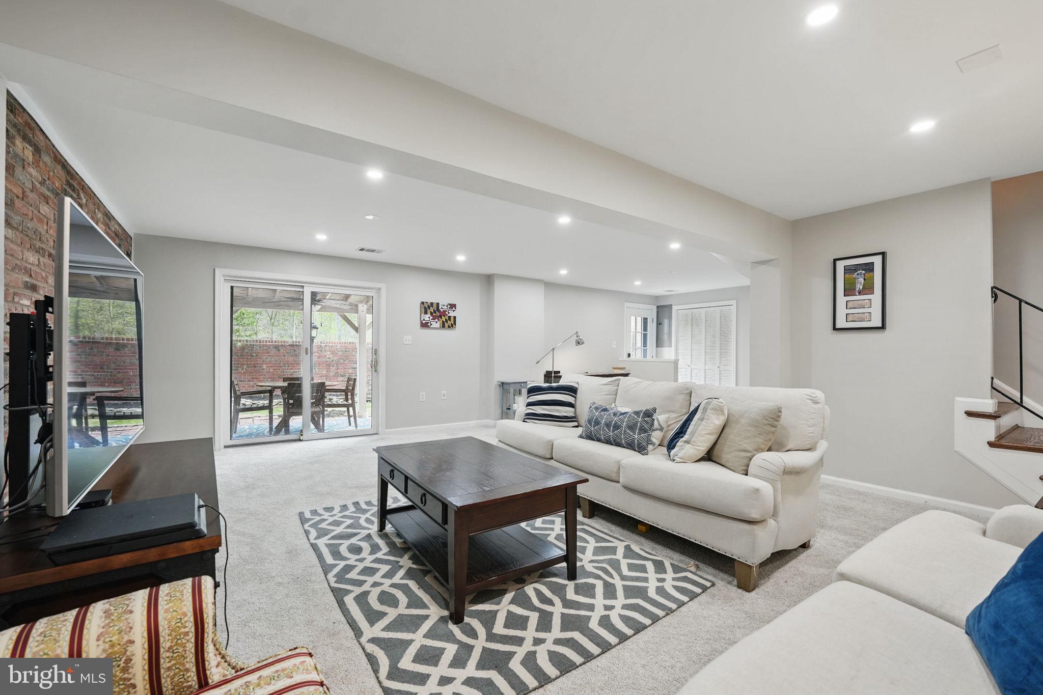 8333 Wickham Road Springfield, VA 22152 - Photo 39 of 54 a living room with furniture and a table