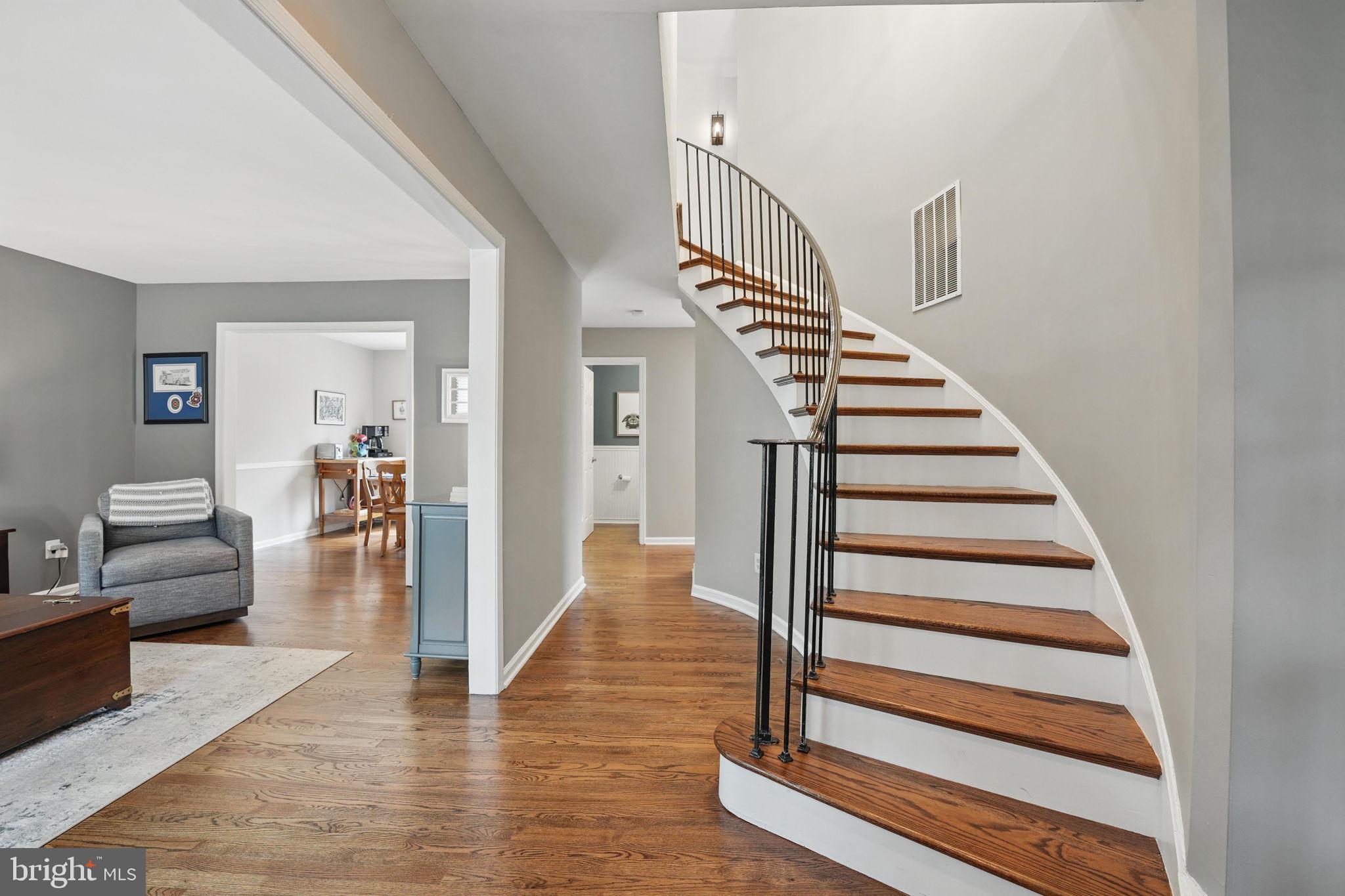 8333 Wickham Road Springfield, VA 22152 - Photo 4 of 54 a view of entryway and hall with wooden floor