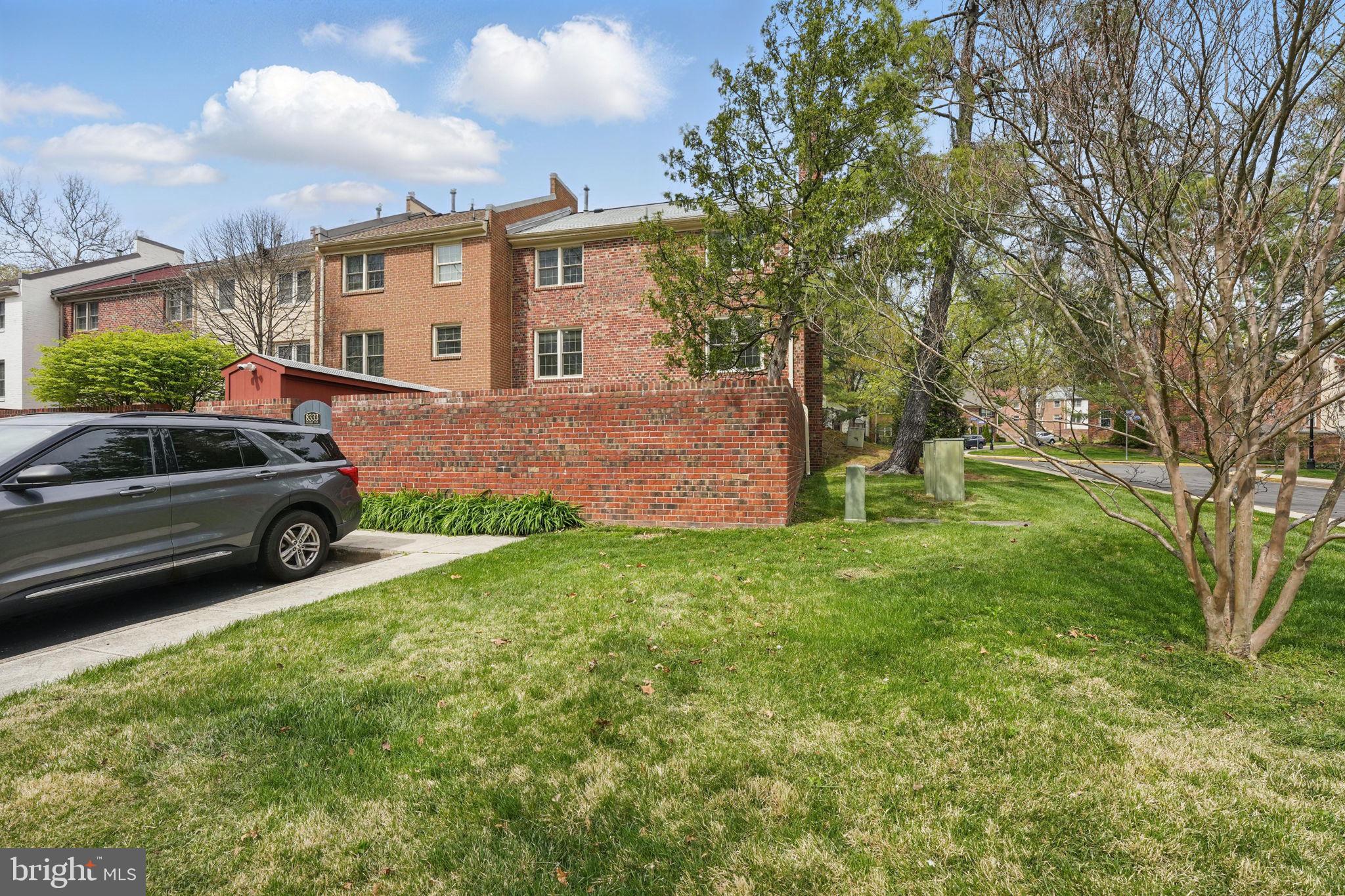 8333 Wickham Road Springfield, VA 22152 - Photo 44 of 54 a view of a house with a back yard