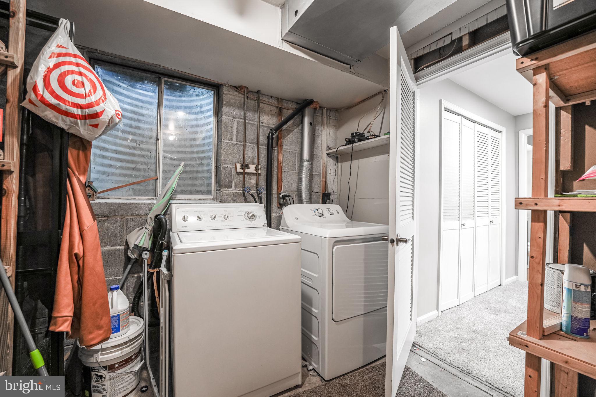 8333 Wickham Road Springfield, VA 22152 - Photo 50 of 54 a utility room with dryer and washer