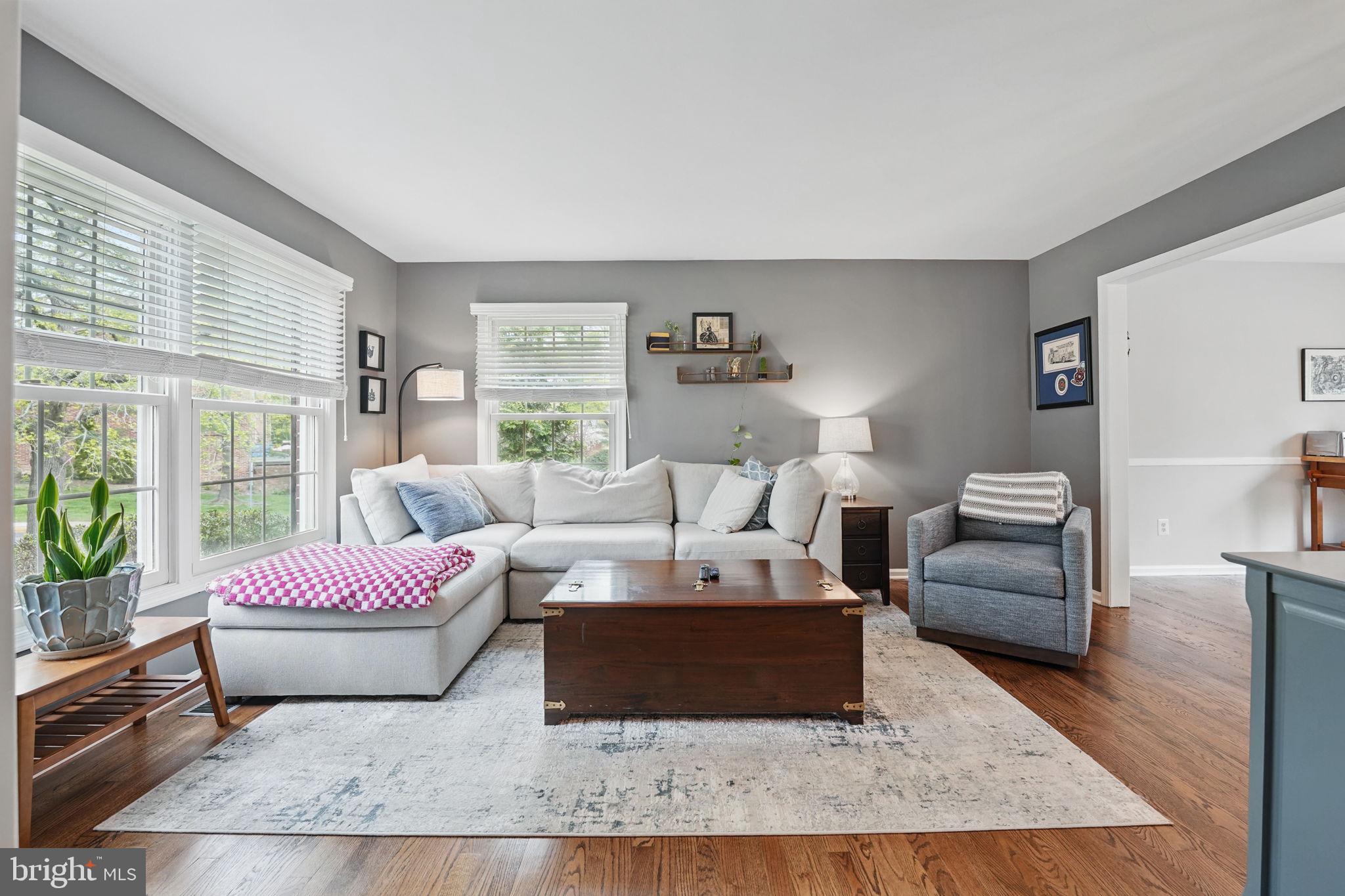 8333 Wickham Road Springfield, VA 22152 - Photo 7 of 54 a living room with furniture and a large window