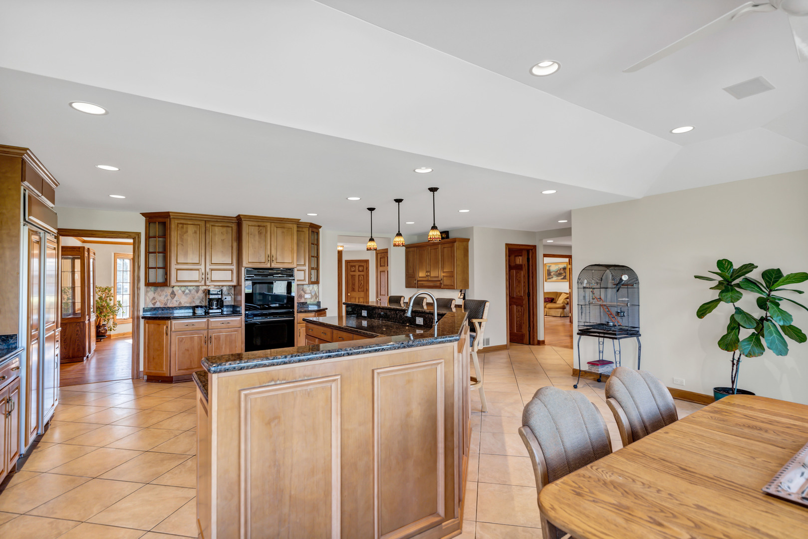 2321 Coach Road Long Grove, IL 60047 - Photo 24 of 83 a living room with furniture and a large mirror with kitchen view