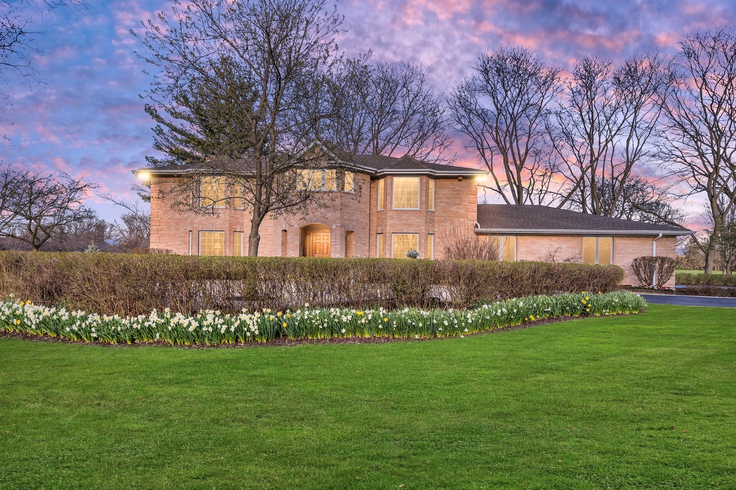 2321 Coach Road Long Grove, IL 60047 - Photo 3 of 83 a front view of a house with a garden