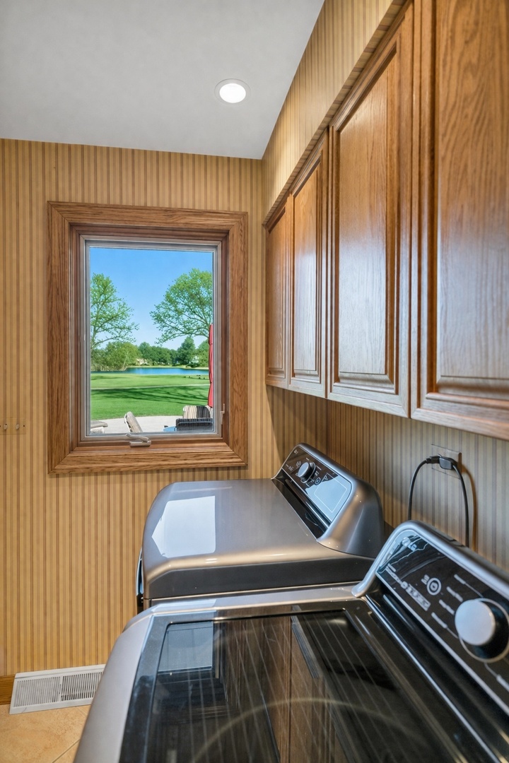 2321 Coach Road Long Grove, IL 60047 - Photo 40 of 83 a blue bench sitting in front of a window