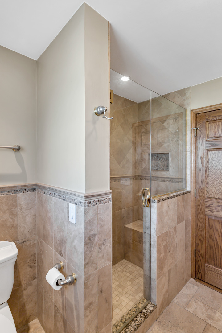 2321 Coach Road Long Grove, IL 60047 - Photo 59 of 83 a bathroom with a shower