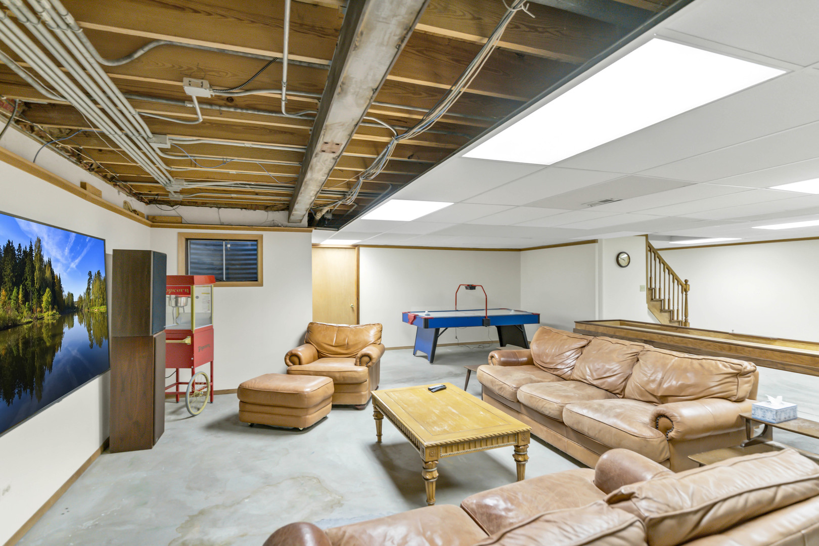 2321 Coach Road Long Grove, IL 60047 - Photo 62 of 83 a living room with furniture and a flat screen tv