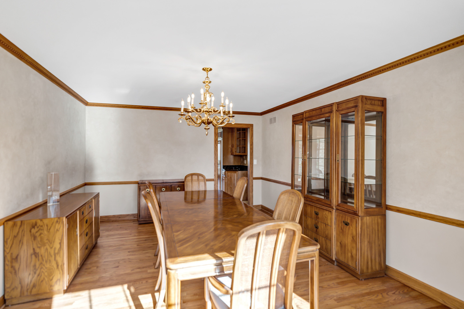 2321 Coach Road Long Grove, IL 60047 - Photo 10 of 83 a view of a dining room with furniture and chandelier