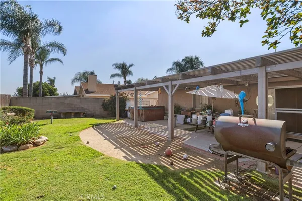 a view of a backyard with a patio