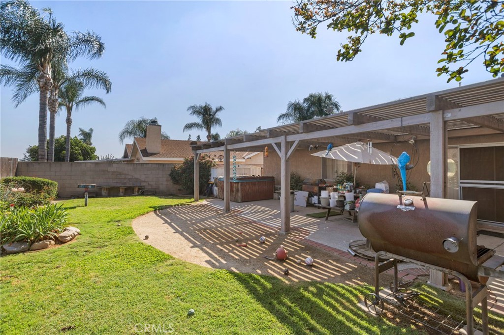 7823 Ramona Avenue Rancho Cucamonga, CA 91730 - Photo 17 of 18 a view of a backyard with a patio