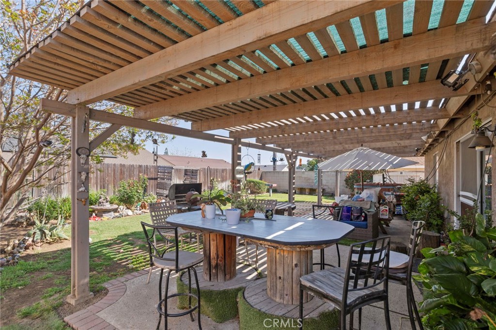 7823 Ramona Avenue Rancho Cucamonga, CA 91730 - Photo 18 of 18 a view of a chairs and table in the patio