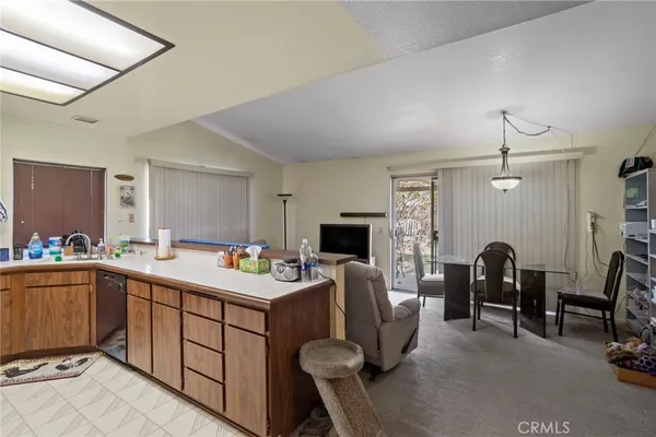 a room with a chair and gym equipment