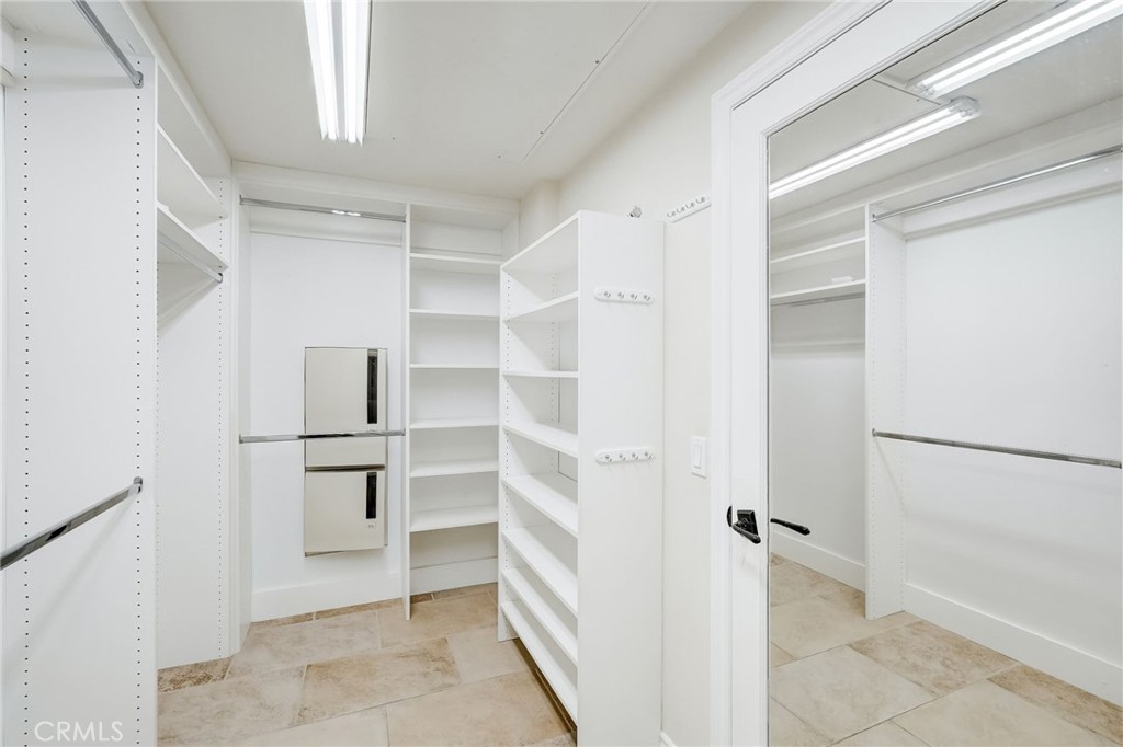 7 Tuscany Ladera Ranch, CA 92694 - Photo 24 of 39 a view of walk in closet with empty racks