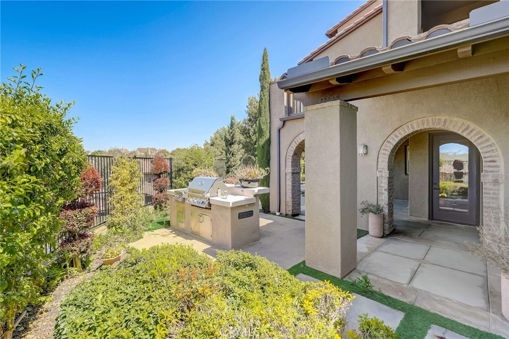 7 Tuscany Ladera Ranch, CA 92694 - Photo 27 of 39 a view of a back yard of the house