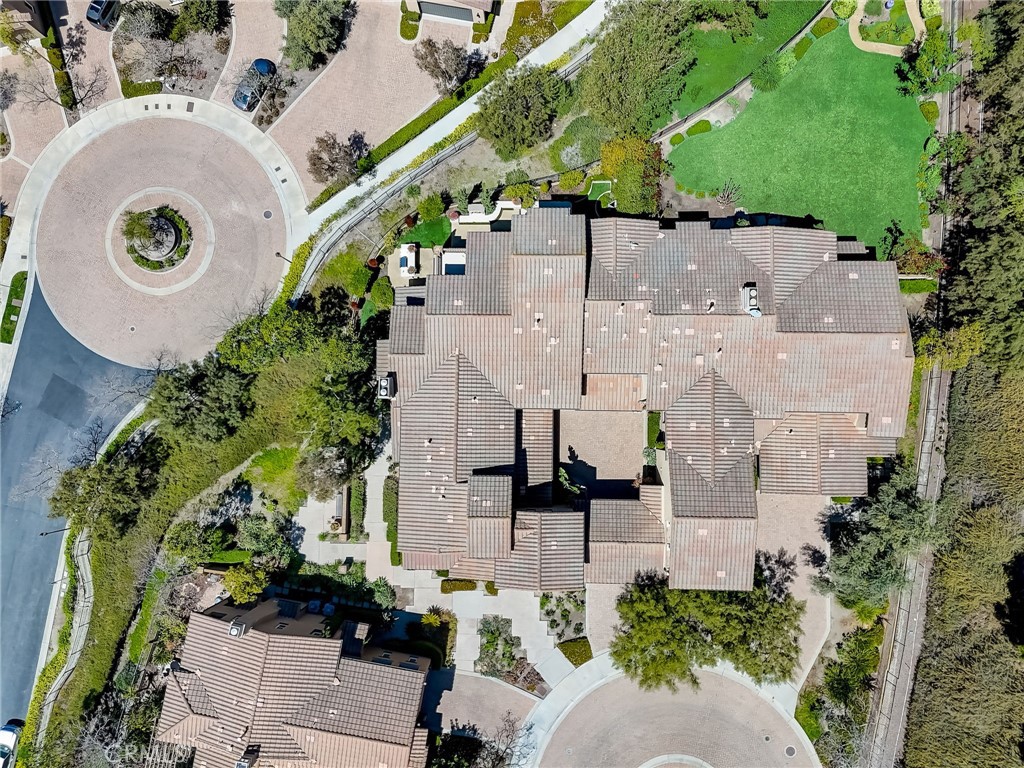 7 Tuscany Ladera Ranch, CA 92694 - Photo 28 of 39 an aerial view of a house with a yard and garden