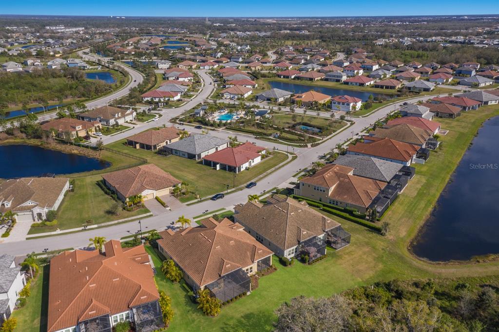 2402 Starwood Court Lakewood Ranch, FL 34211 - Photo 41 of 71 an aerial view of residential houses with outdoor space