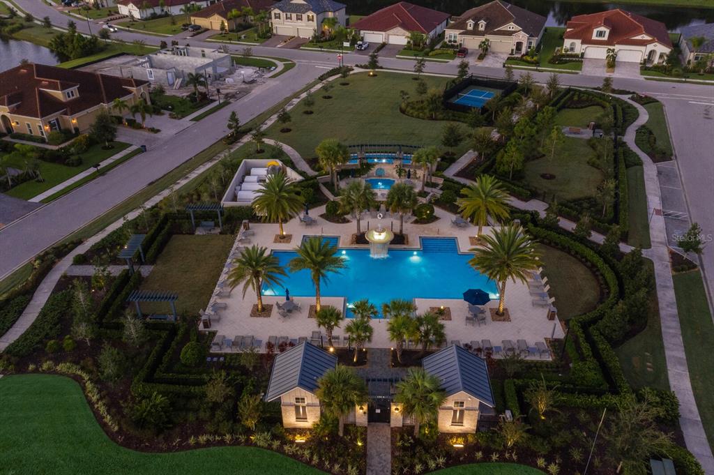 2402 Starwood Court Lakewood Ranch, FL 34211 - Photo 57 of 71 an aerial view of multiple houses with yard