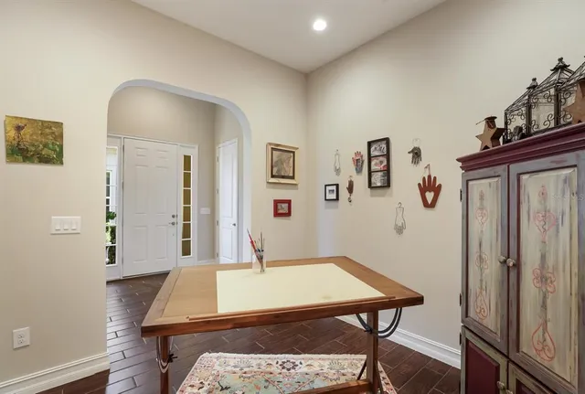 a view of an entryway with wooden floor