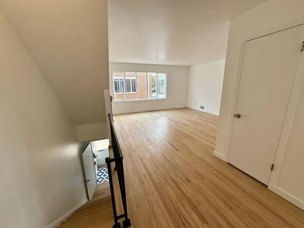 a view of entryway with wooden floor
