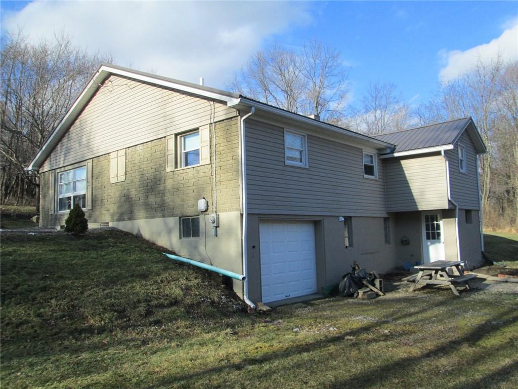 1651 Freeport Road Kittanning, PA 16201 - Photo 2 of 11 a view of a back yard of the house