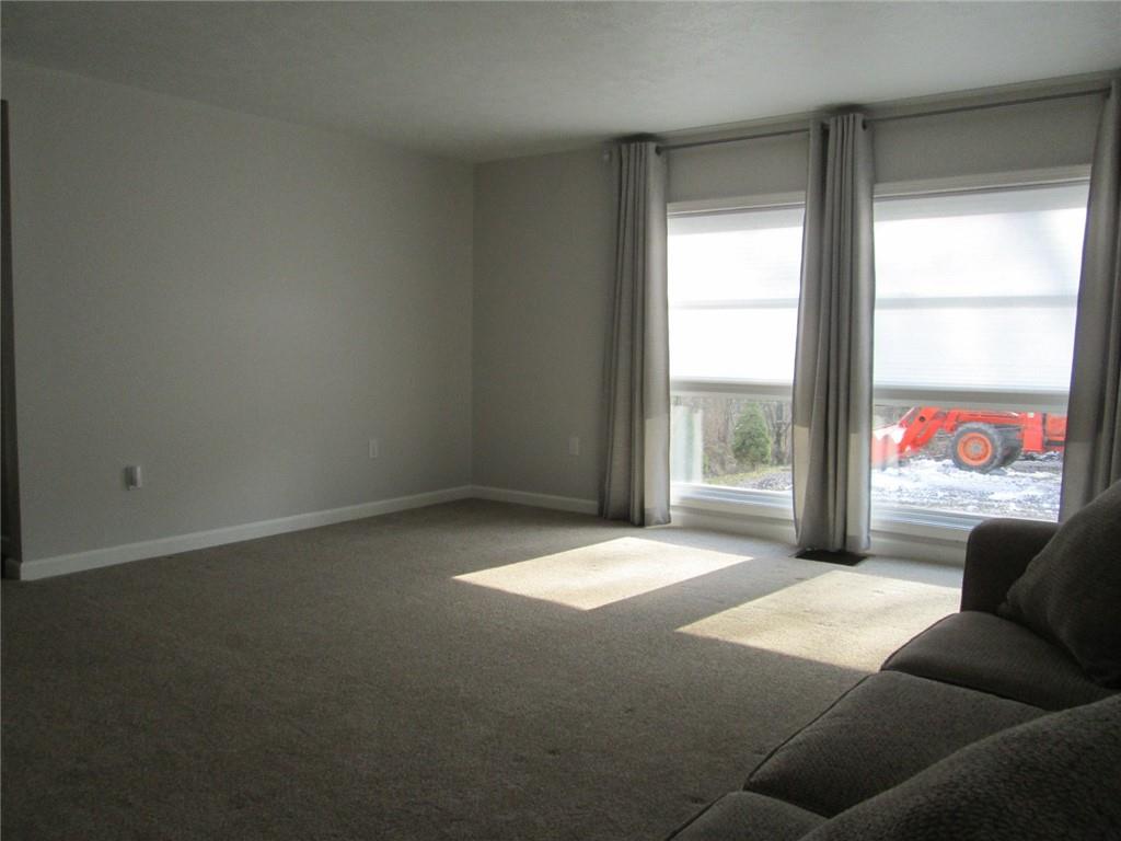 1651 Freeport Road Kittanning, PA 16201 - Photo 7 of 11 a living room with furniture and a large window