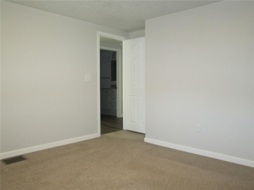 1651 Freeport Road Kittanning, PA 16201 - Photo 10 of 11 an empty room with an entryway