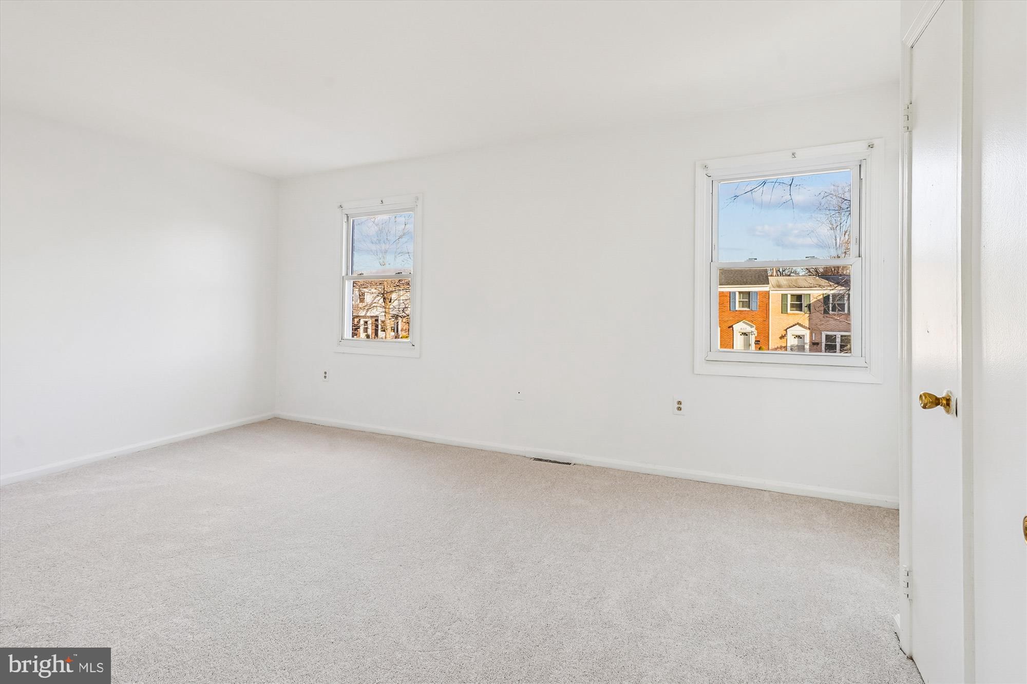 8347 Irongate Way Manassas, VA 20109 - Photo 16 of 42 an empty room with a window and a wall painting