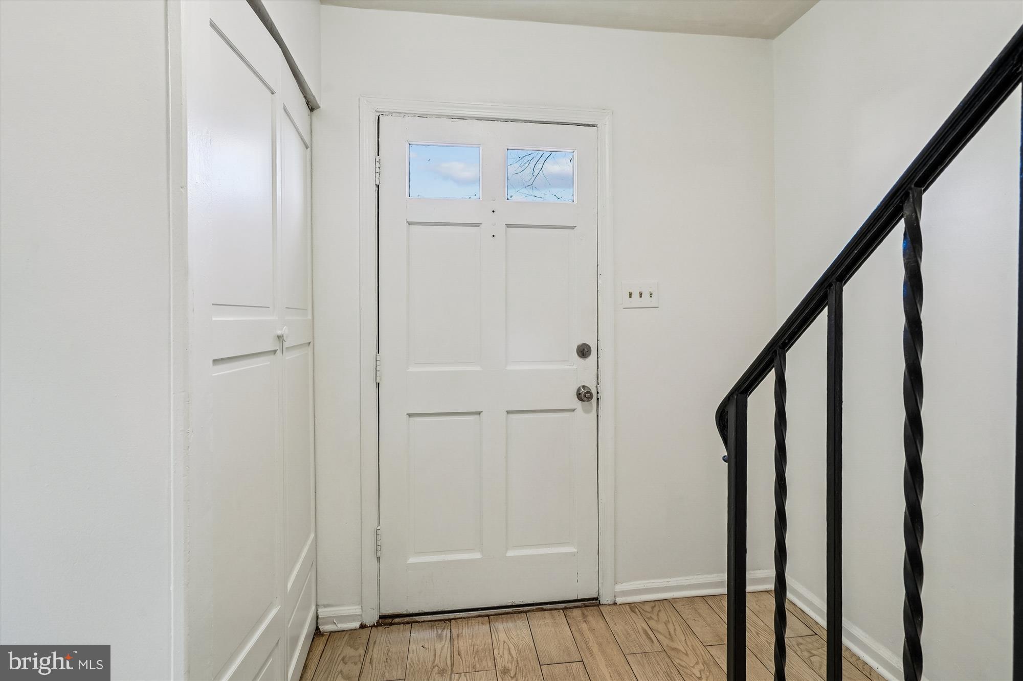 8347 Irongate Way Manassas, VA 20109 - Photo 2 of 42 a view of an entryway with staircase