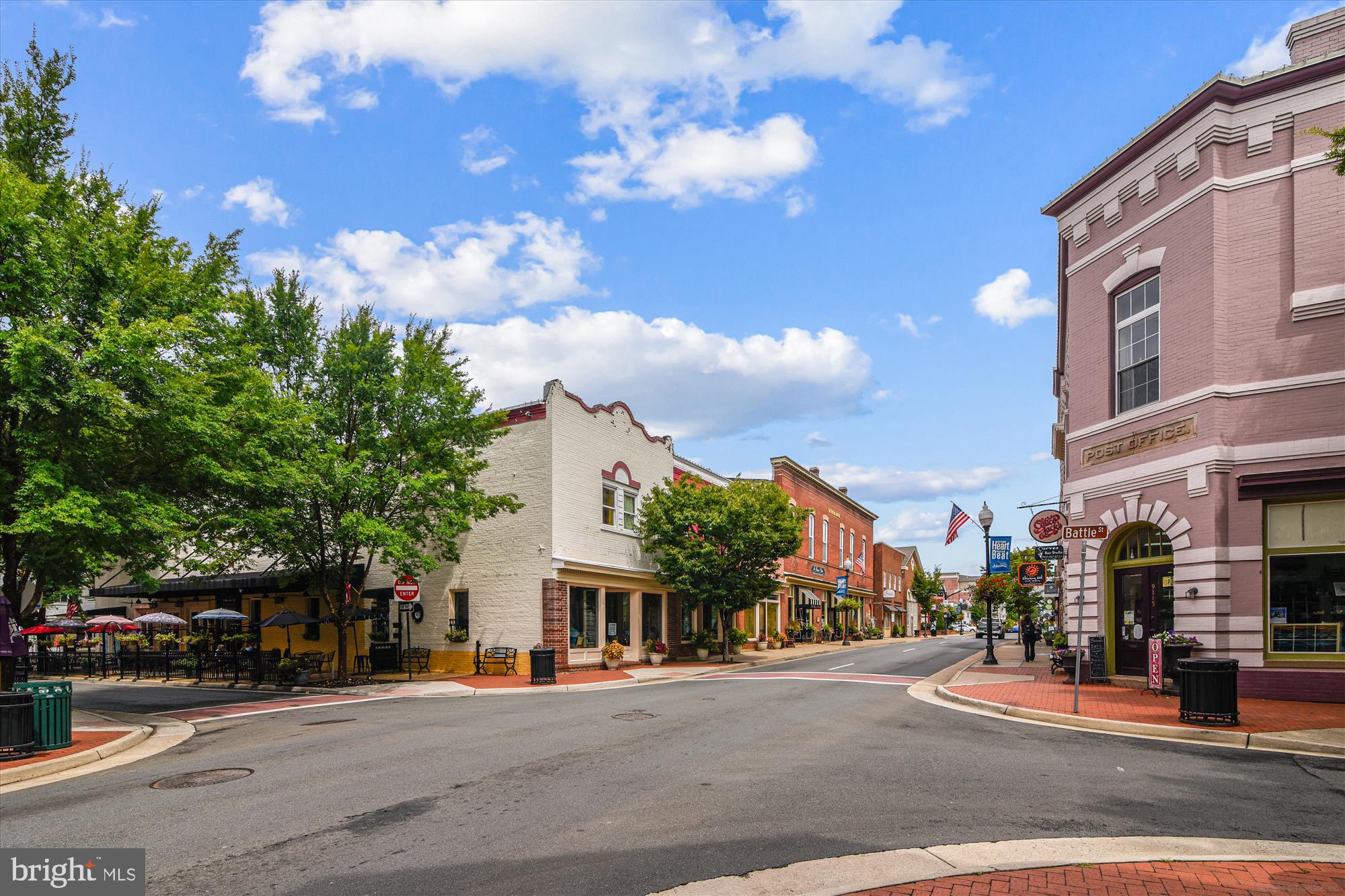 8347 Irongate Way Manassas, VA 20109 - Photo 34 of 42 a city street lined with buildings and trees