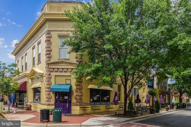 a front view of a building with street view