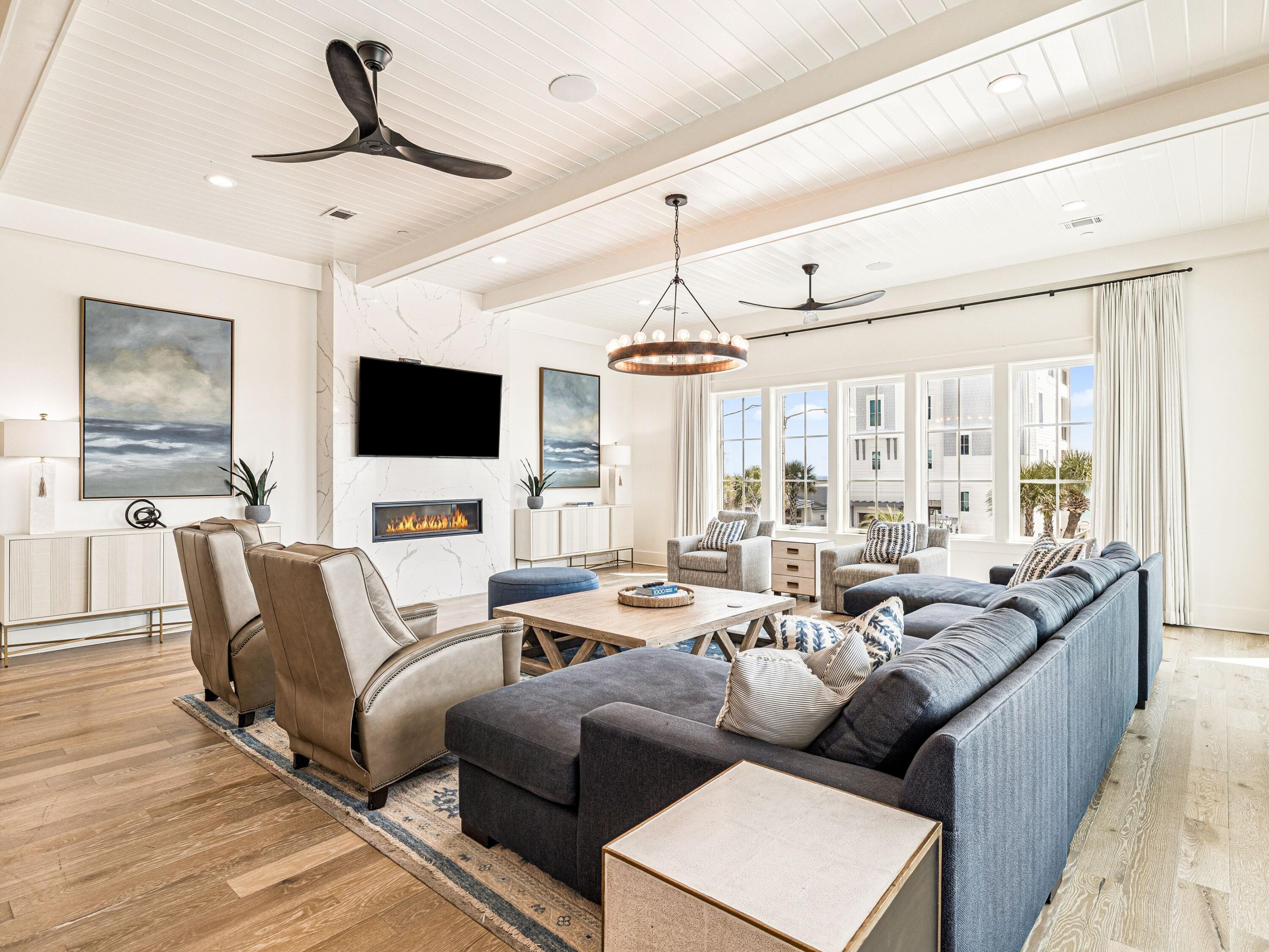91 Emerald Cove Lane North Inlet Beach, FL 32461 - Photo 26 of 53 a living room with furniture and a flat screen tv