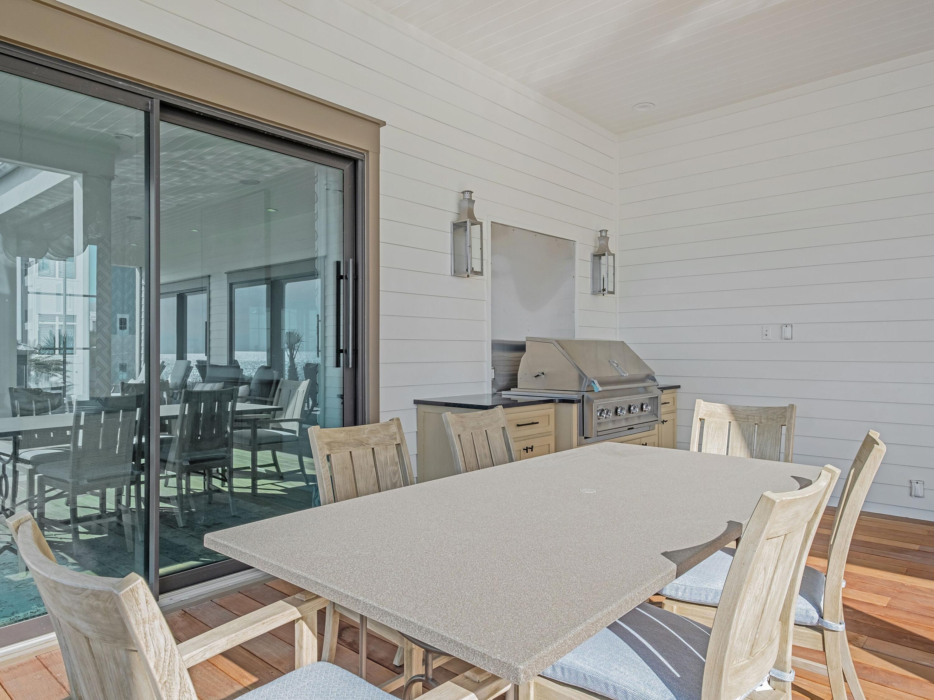 91 Emerald Cove Lane North Inlet Beach, FL 32461 - Photo 28 of 53 a view of a dining room with furniture