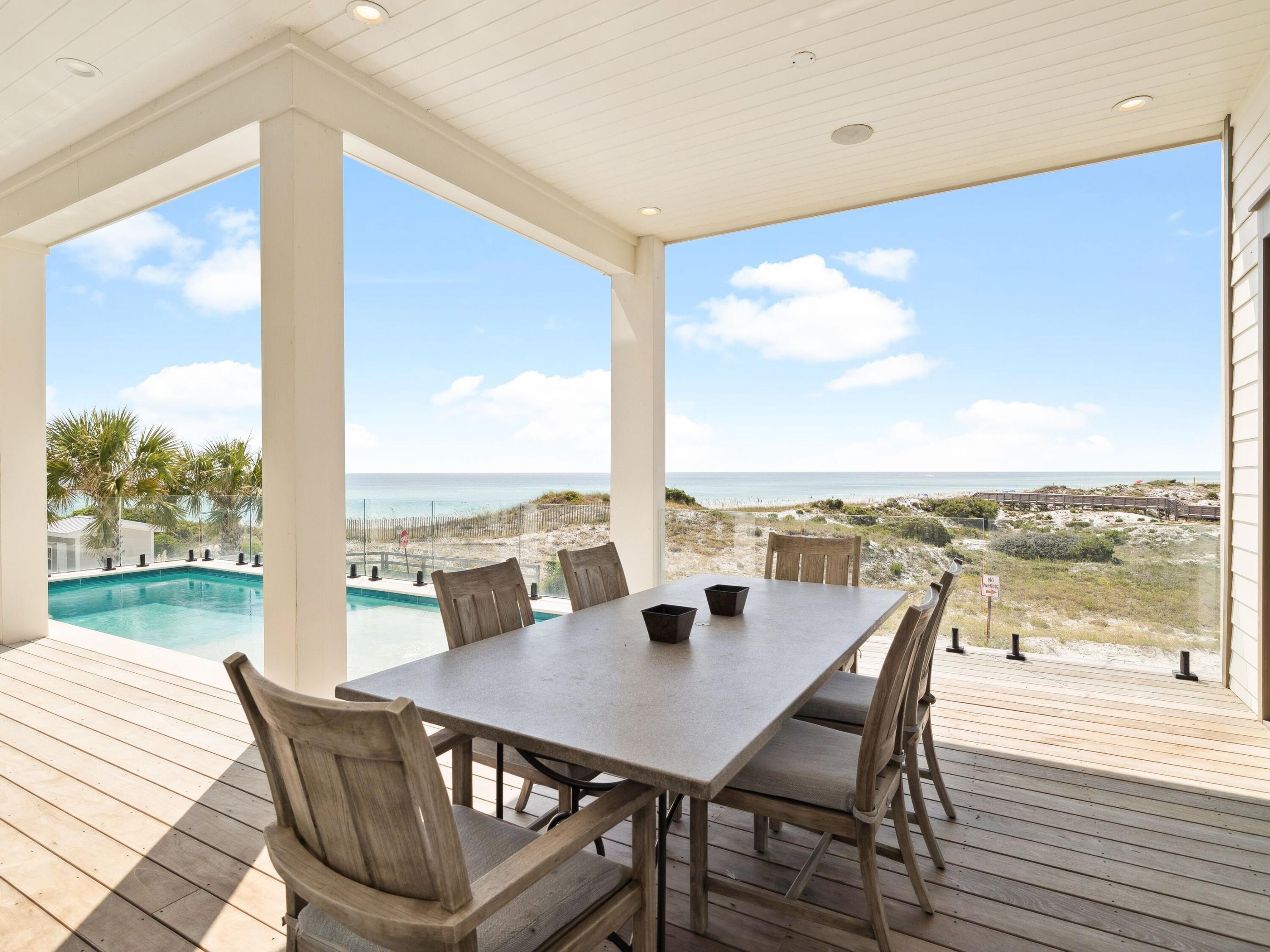 91 Emerald Cove Lane North Inlet Beach, FL 32461 - Photo 30 of 53 a view of an outdoor space with furniture and garden